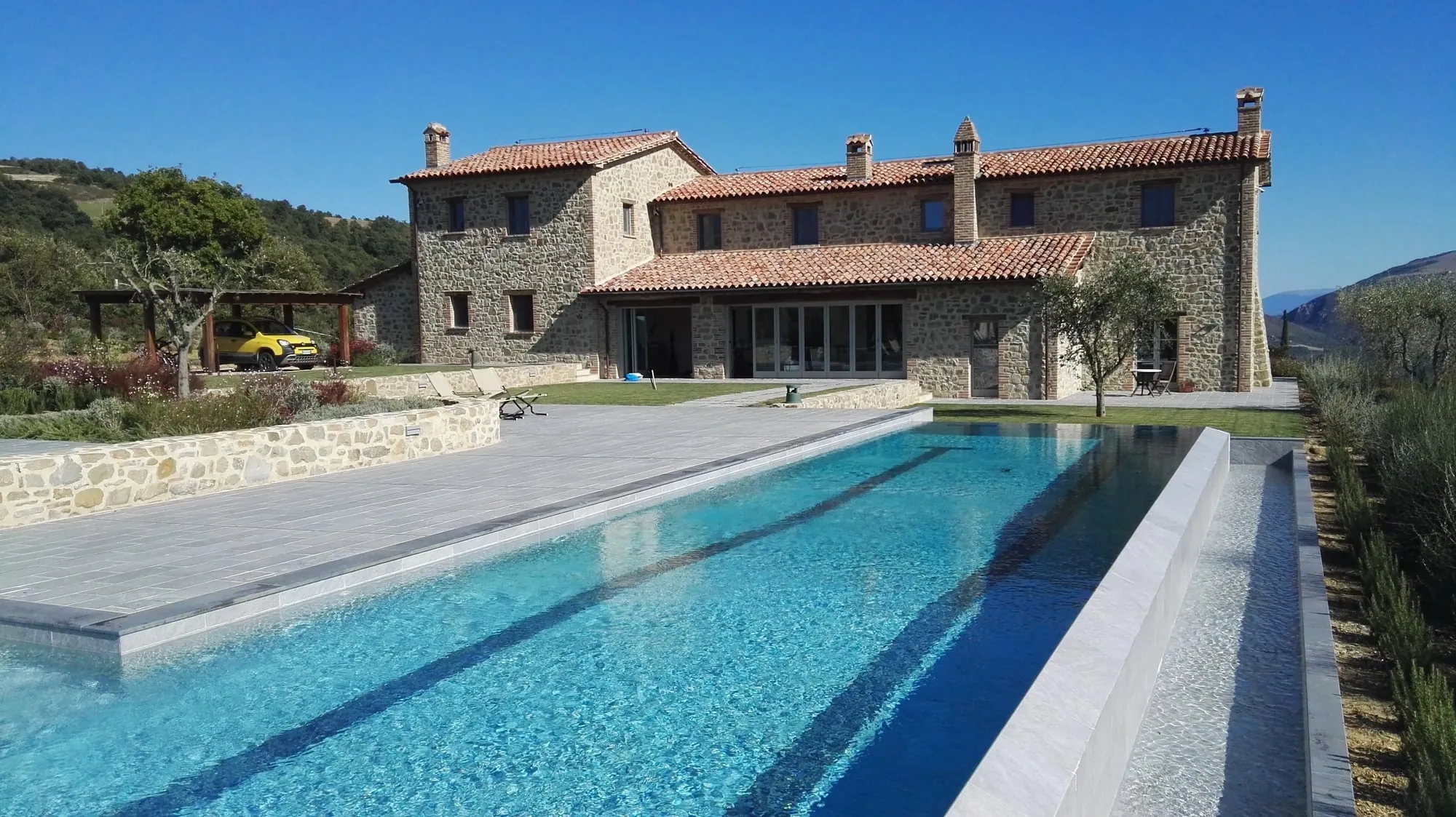 Stone villa with a pool at Casa Laghetto